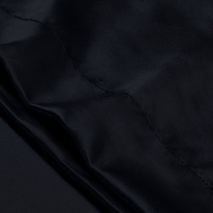 Close-up of the envelope closure on the satin pillowcase