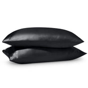 2 satin pillowcases on pillows stacked