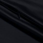Close-up of poly satin pillowcase with a zipper