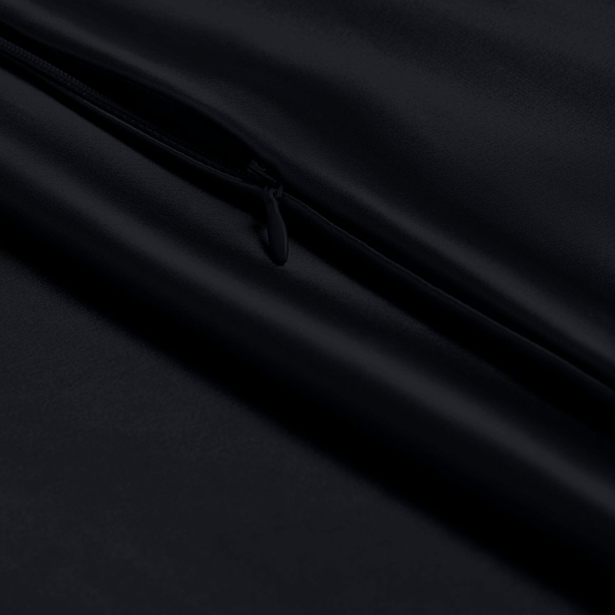 Close-up of poly satin pillowcase with a zipper