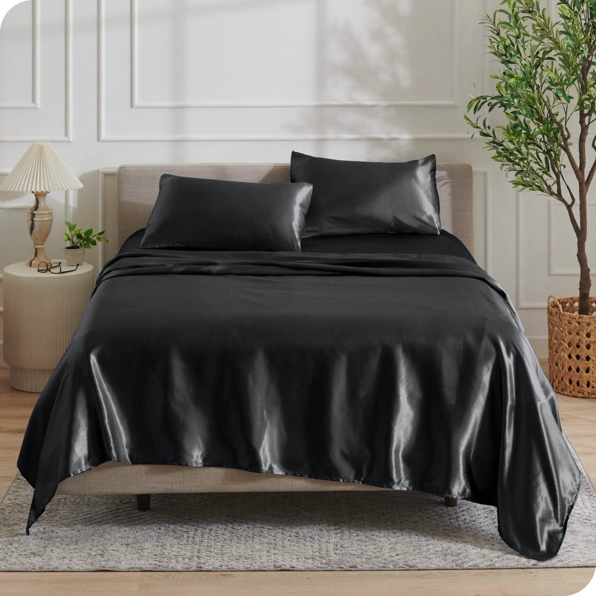 Satin sheets drapped over a mattress