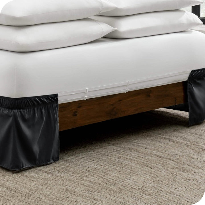 The adjustable elastic bands on a bed skirt