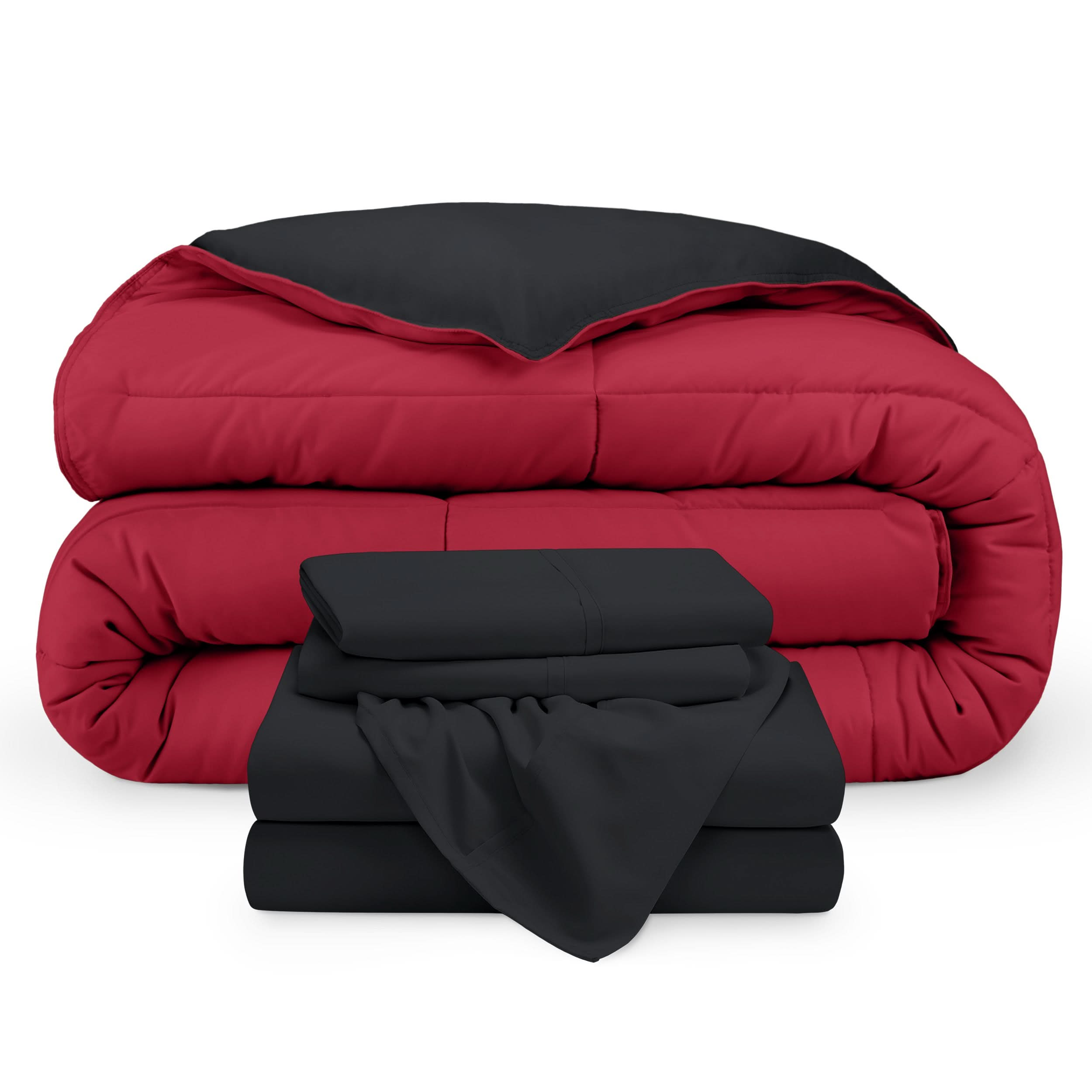 A reversible microfiber comforter and a coordinating sheet set folded and stacked