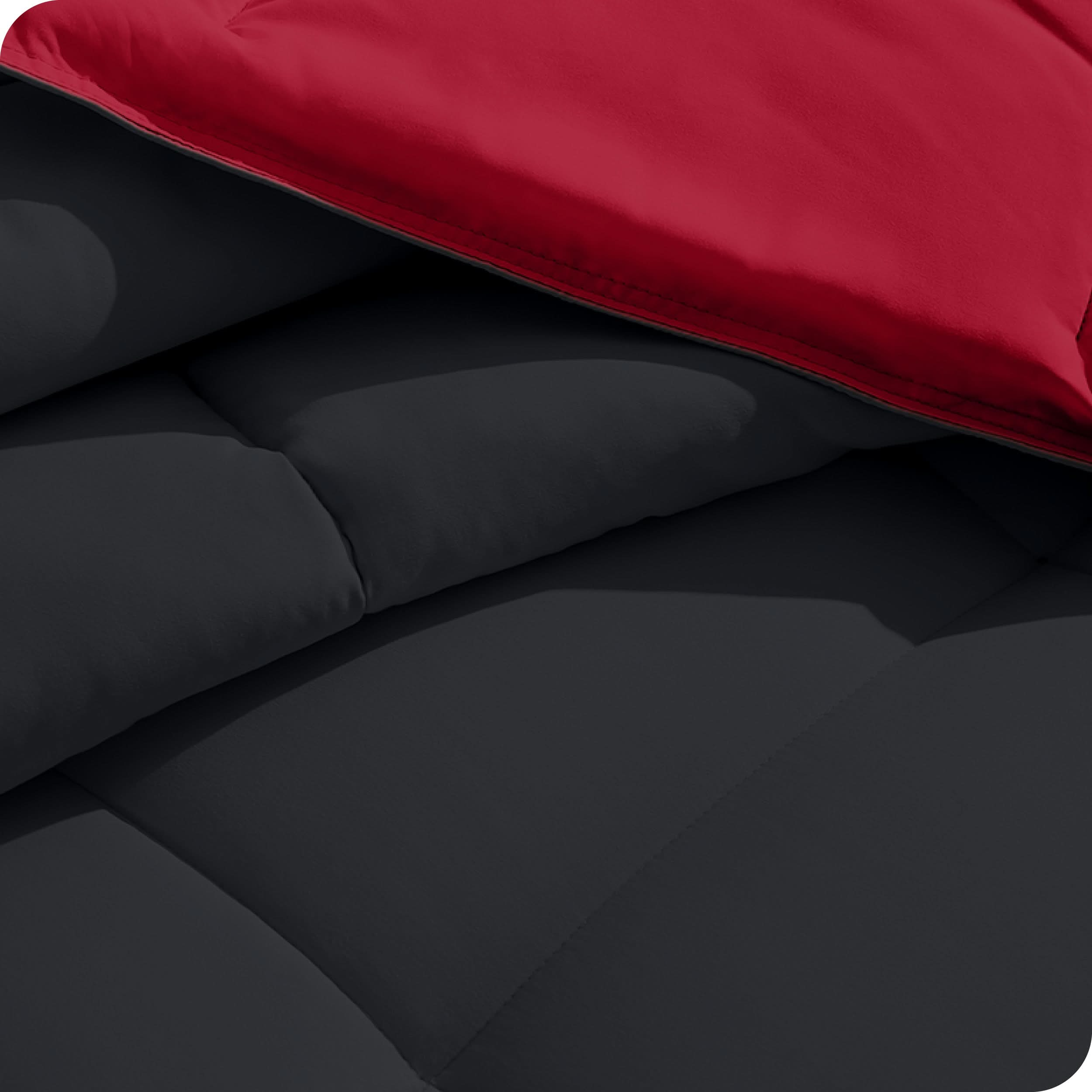 Close up of the reversible comforter showing the box stitching and the two colors