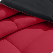 Close up of the reversible comforter showing the box stitching and the two colors