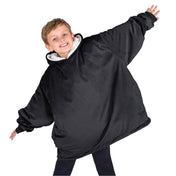 A child with a wearable blanket on