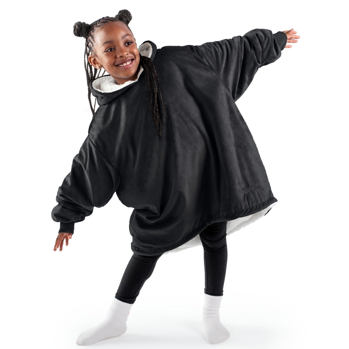 A youth wearable blanket on a child
