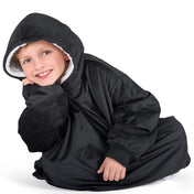 Close up of a sherpa wearable blanket on a child