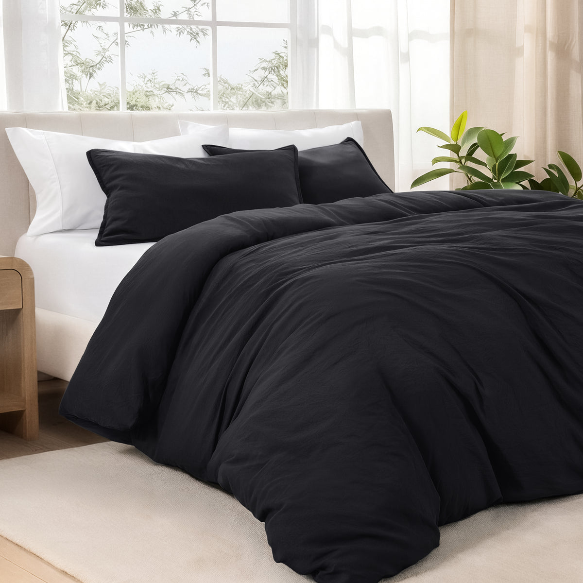 Bedding set on a bed in a bright room with natural light