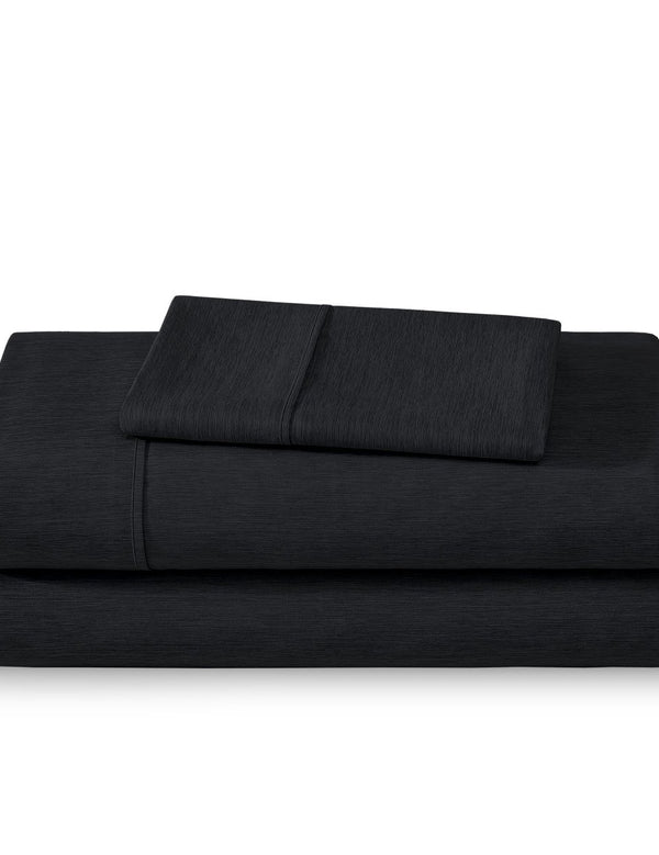 Microfiber sheet set folded and stacked neatly
