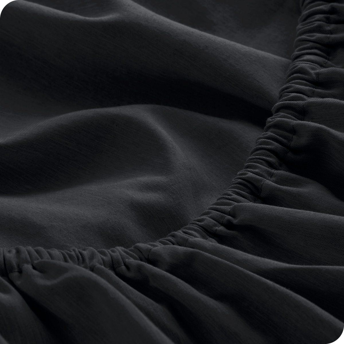 Close-up of fitted sheet with elastic edge
