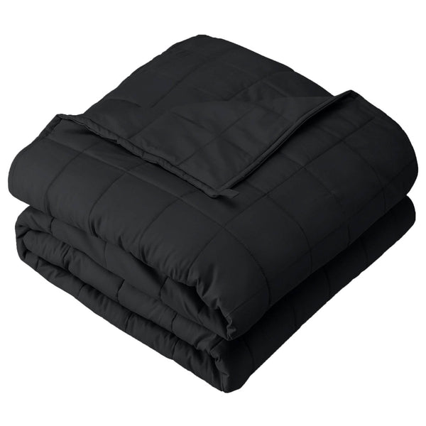 A folded cotton weighted blanket with a white background