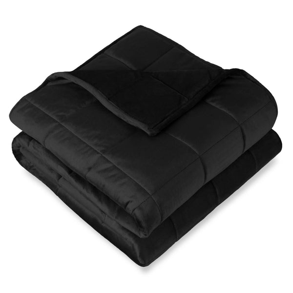 A folded minky weighted blanket with a white background