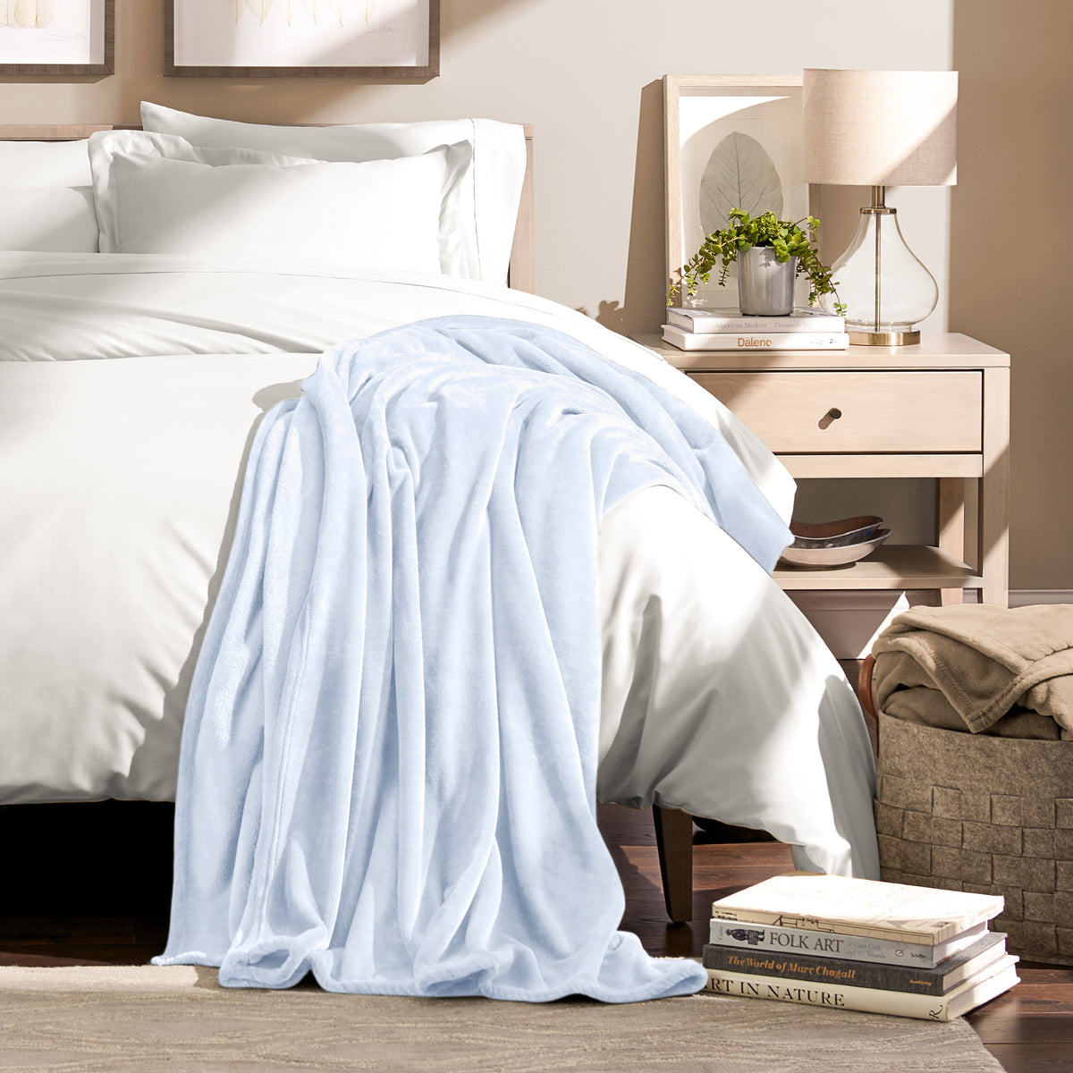 Microplush blanket draped over the corner of a bed