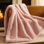 Blanket draped over a chair in front of a fireplace