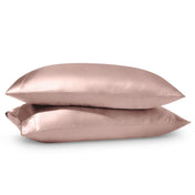 2 satin pillowcases on pillows stacked