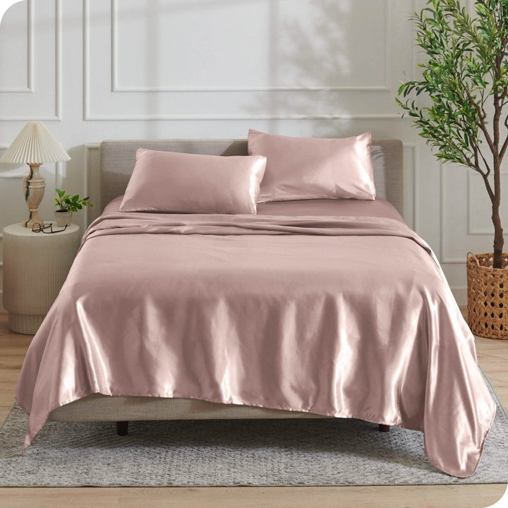 Satin sheets drapped over a mattress