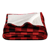 Red and black checkered blanket with white interior on a white background