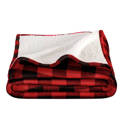 Red and black checkered blanket with white interior on a white background
