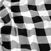 Black and white checkered pattern with wrinkled texture