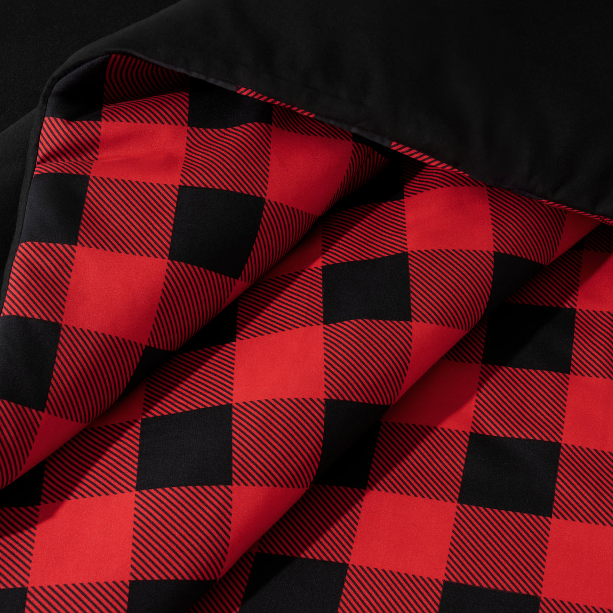Close-up of comforter on a bed