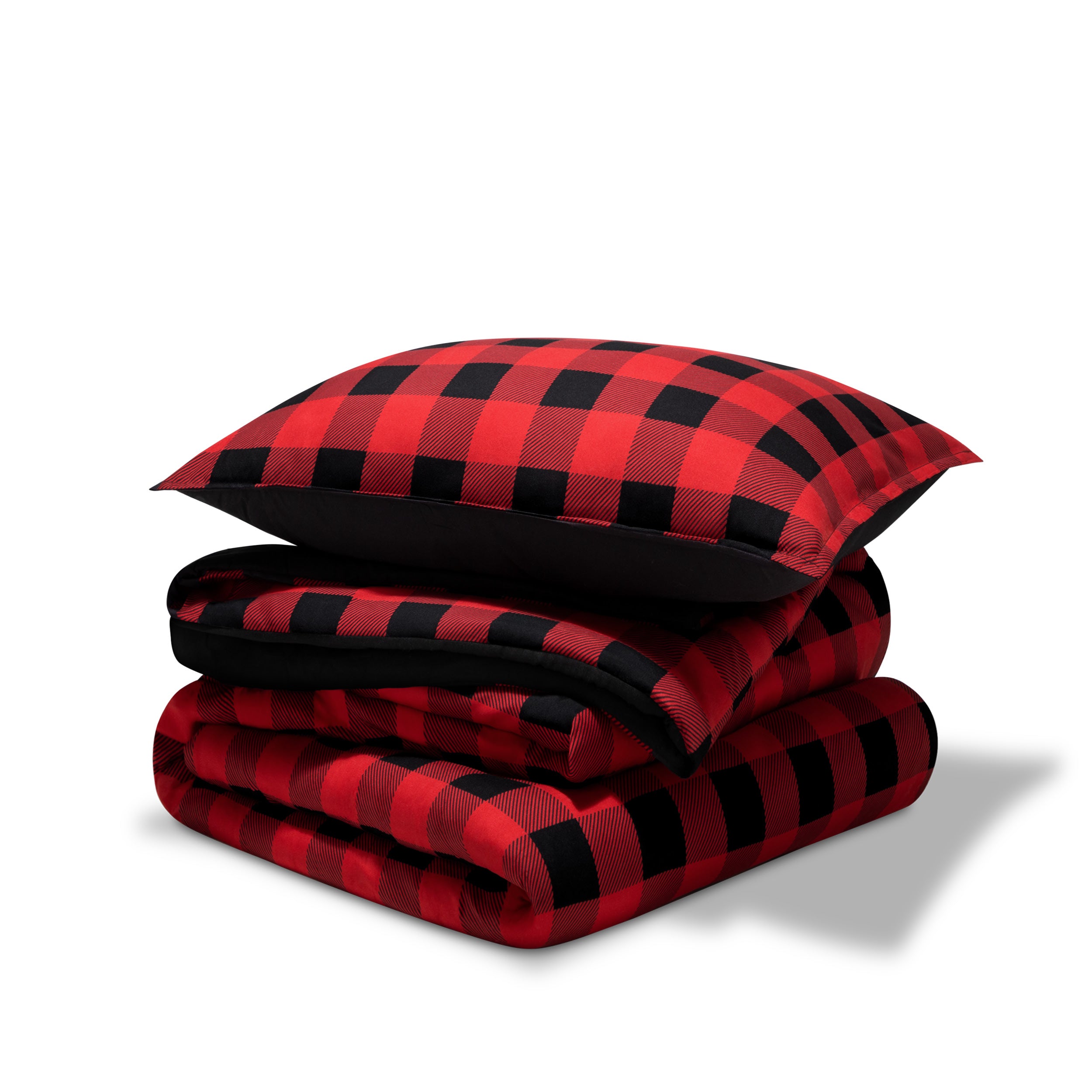 A printed comforter set folded and stacked