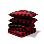 A comforter set folded and stacked