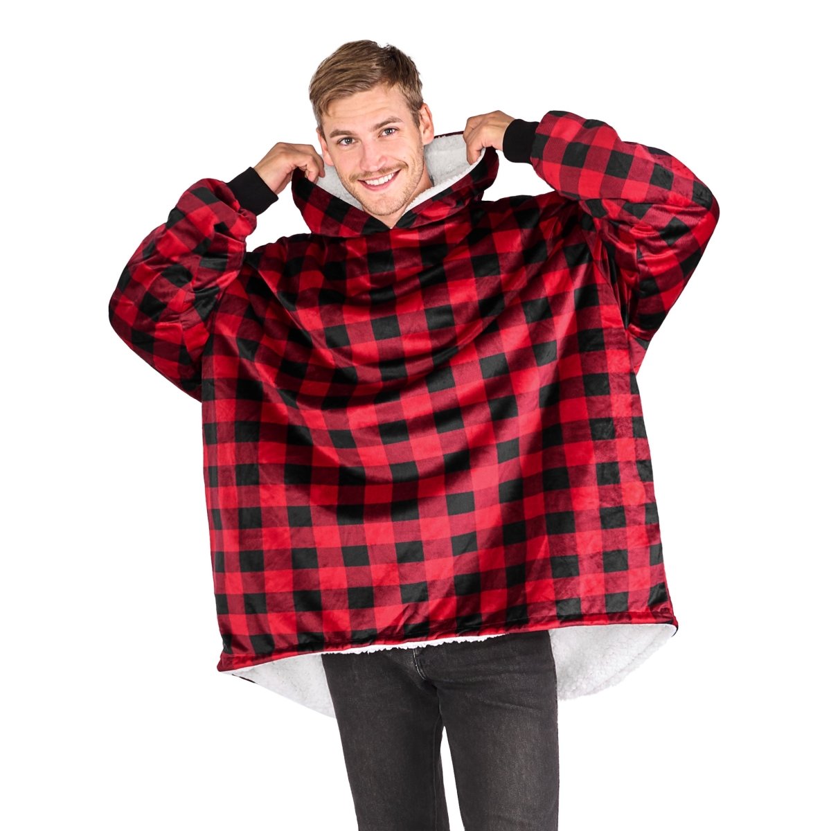An adult with a sherpa wearable blanket on