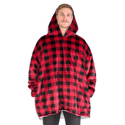 Person wearing a hooded blanket on a white background