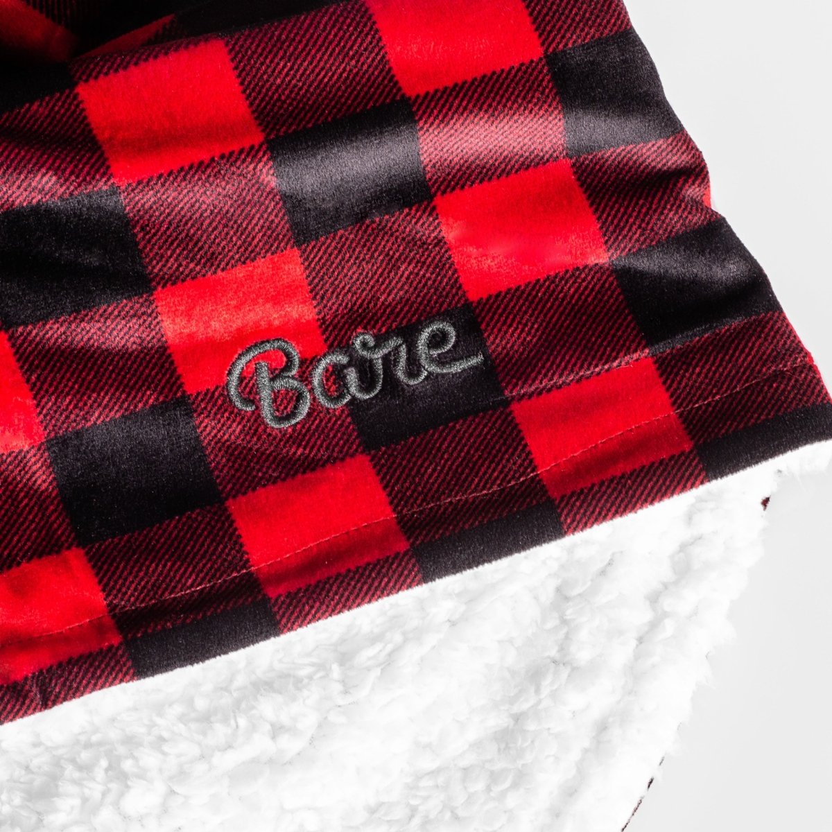 Wearable blanket fabric with 'Bare' embroidery