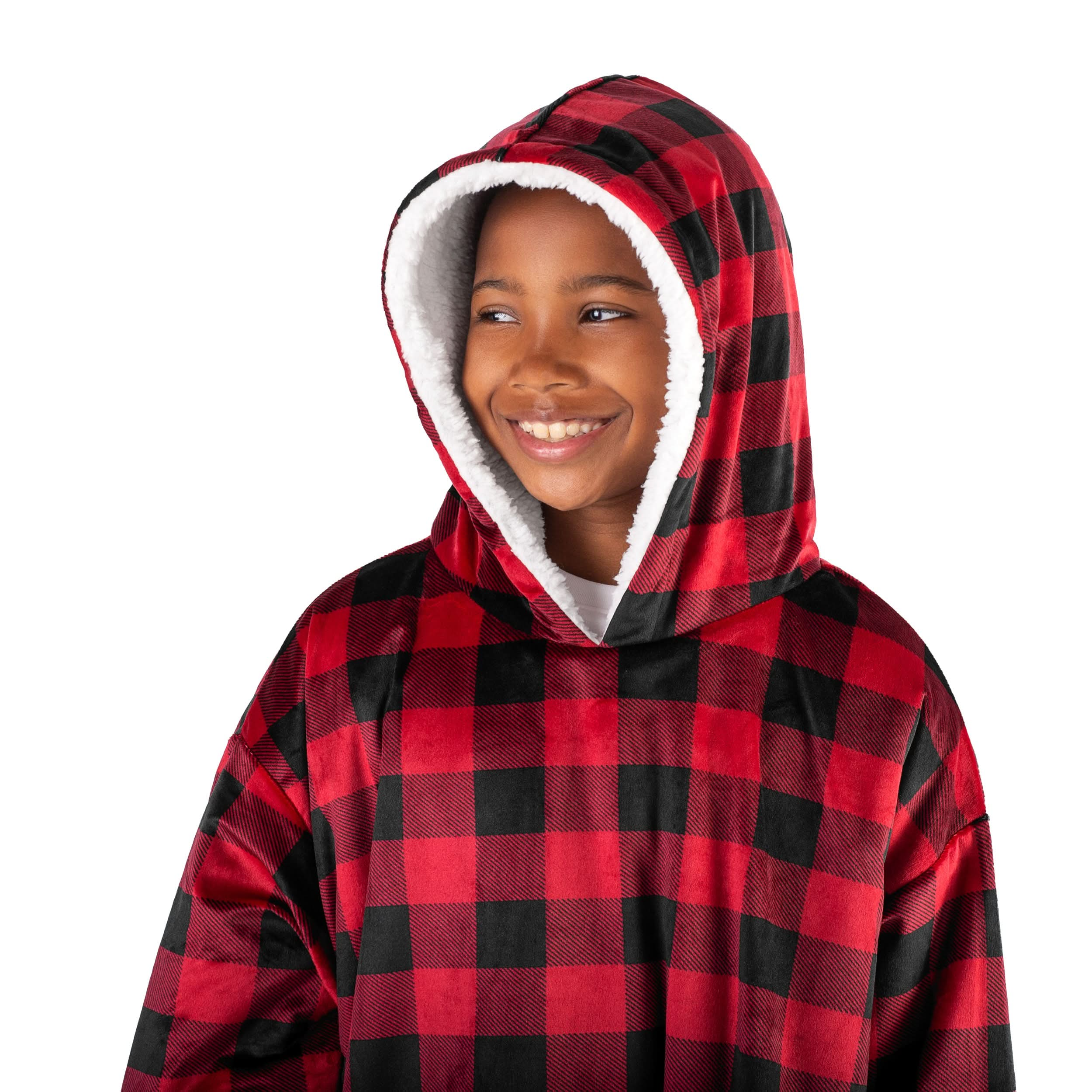 A boy with a hooded wearable blanket on