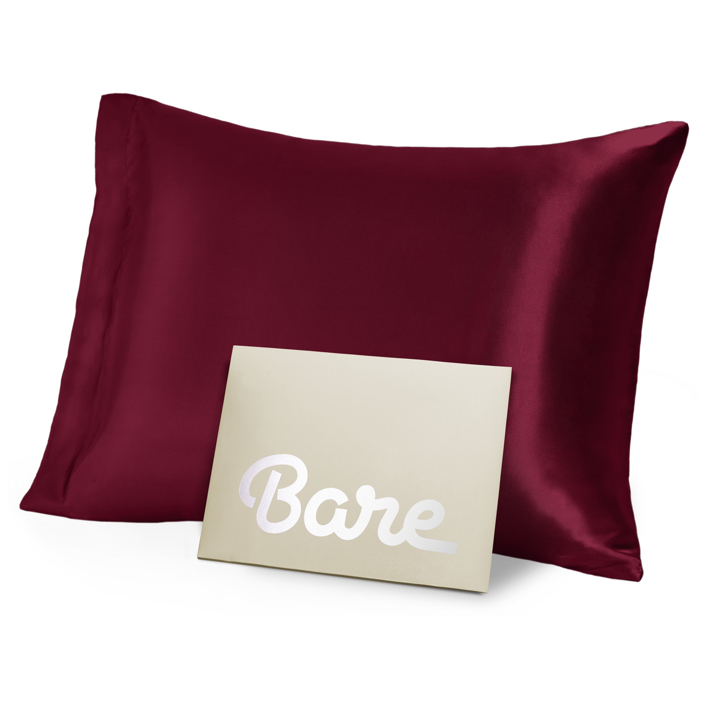 A red mulberry silk pillowcase on a pillow