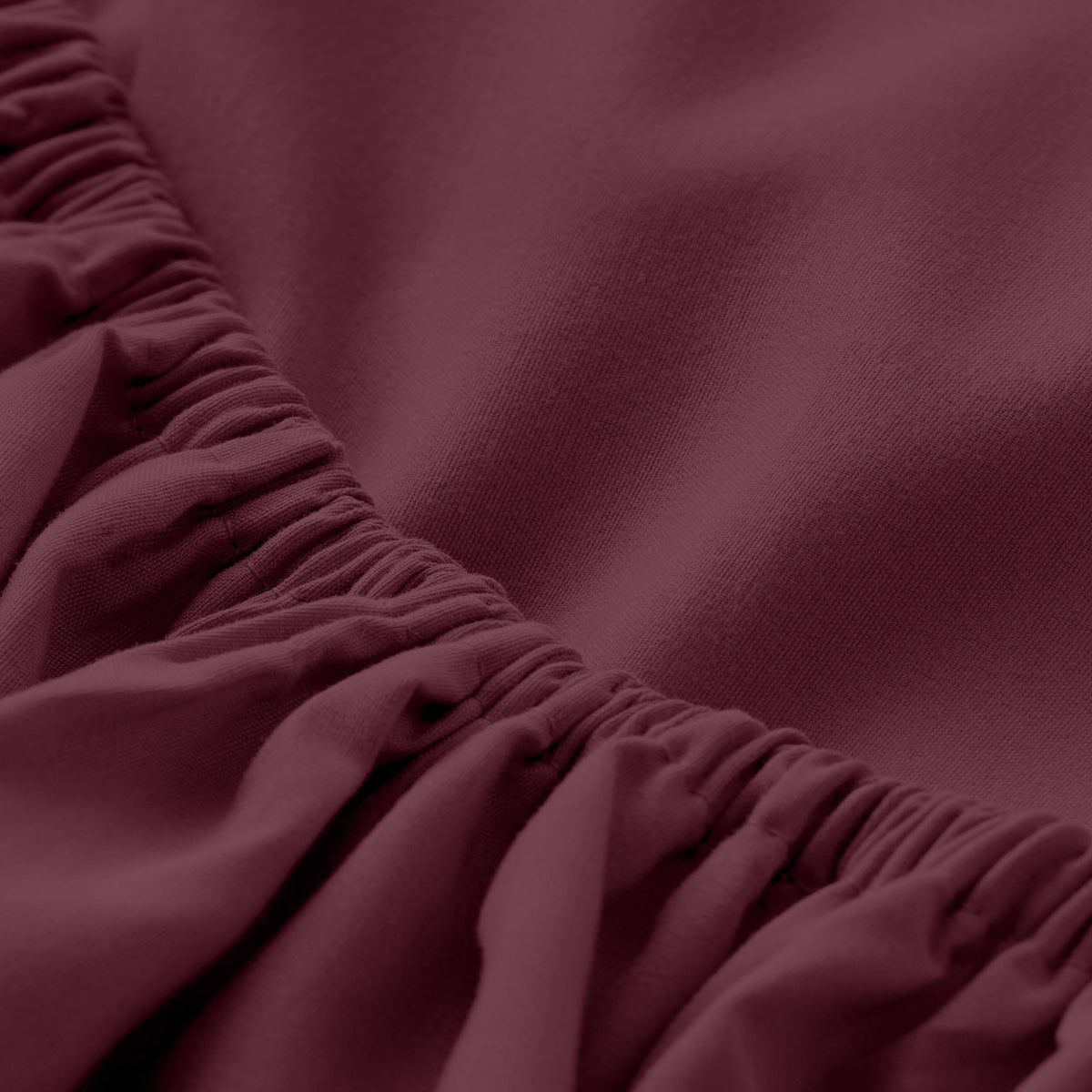 Close-up of fitted sheet with all around elastic