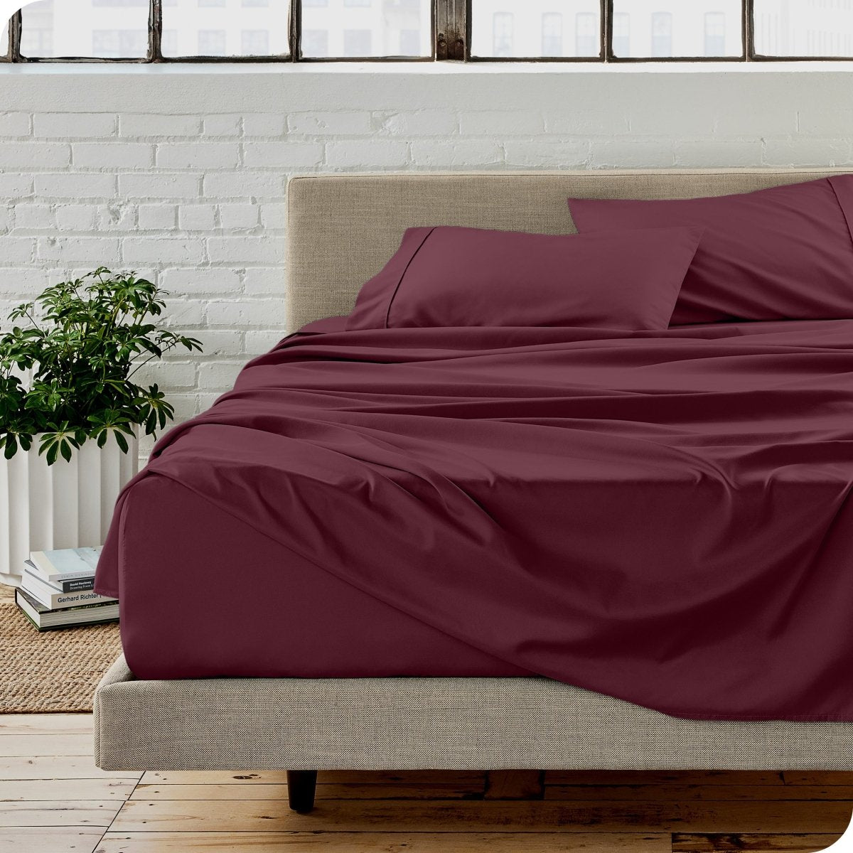 A modern bedroom with microfiber sheets on the mattress