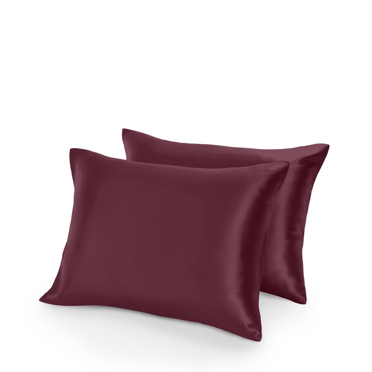 Two satin pillowcases on a white background