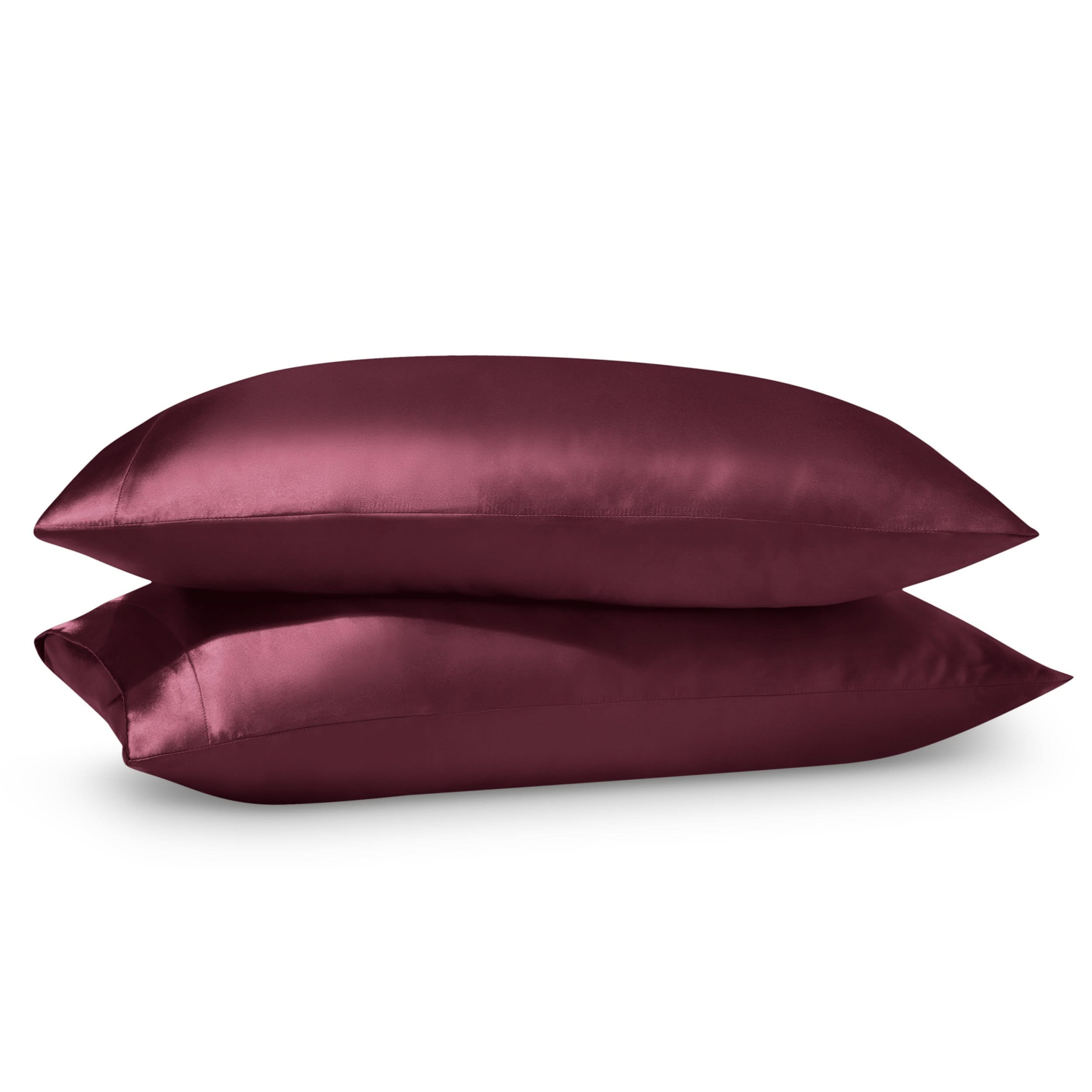 2 satin pillowcases on pillows stacked