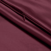 Close-up of poly satin pillowcase with a zipper