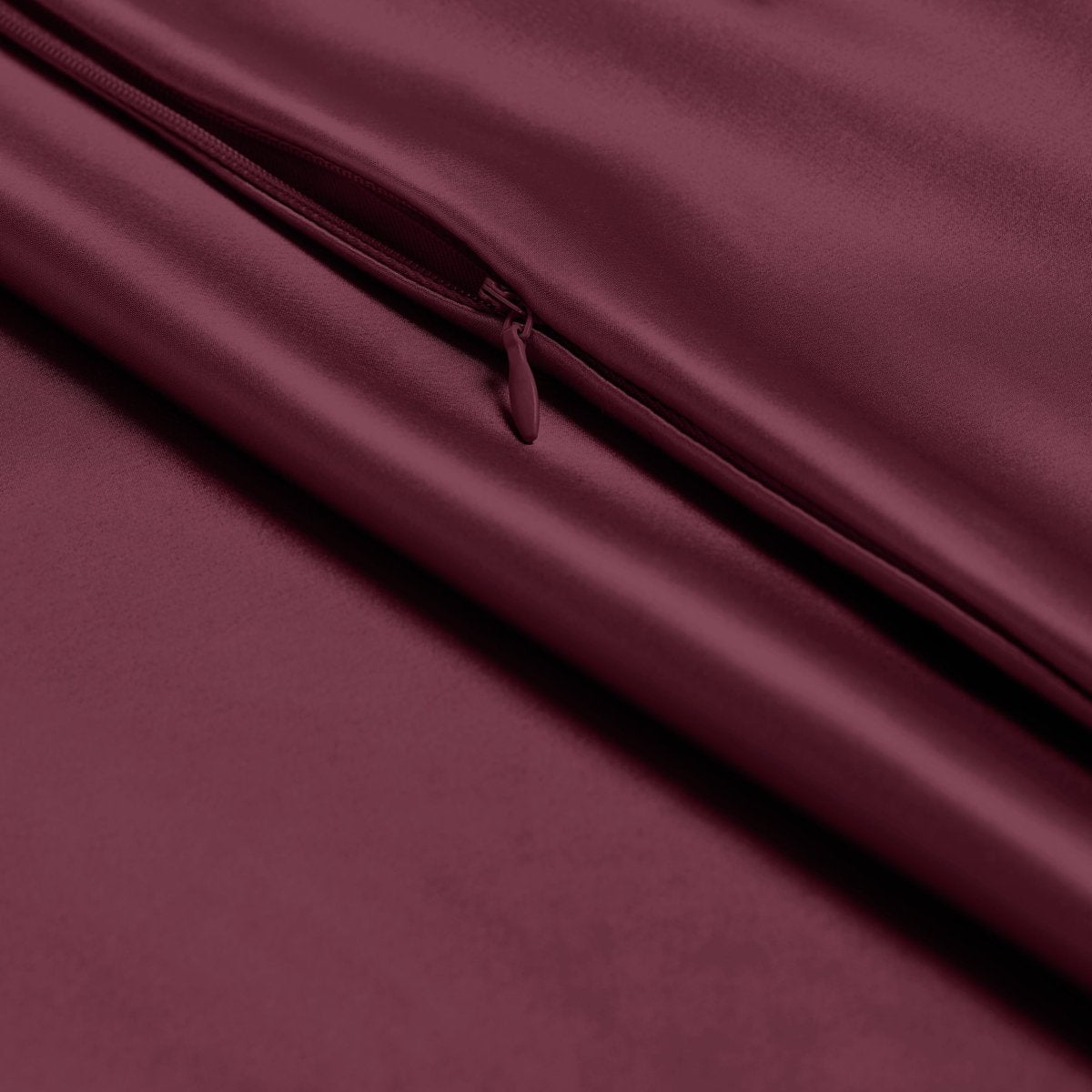 Close-up of poly satin pillowcase with a zipper