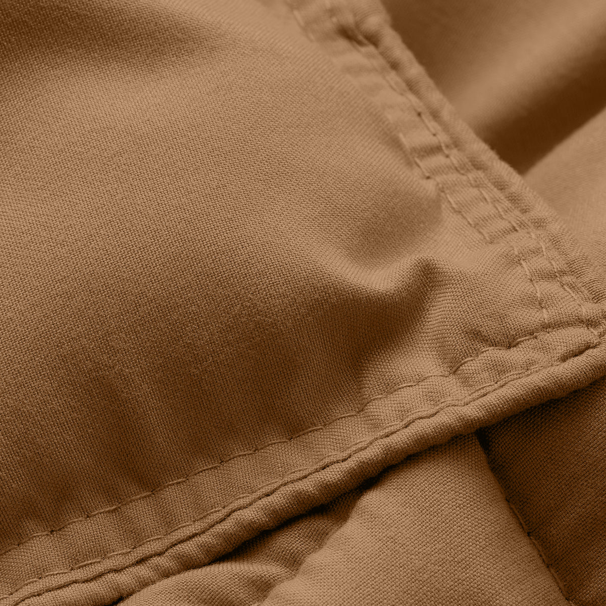 Close-up of comforter fabric with stitching detail