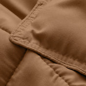Close-up of comforter fabric with stitching detail