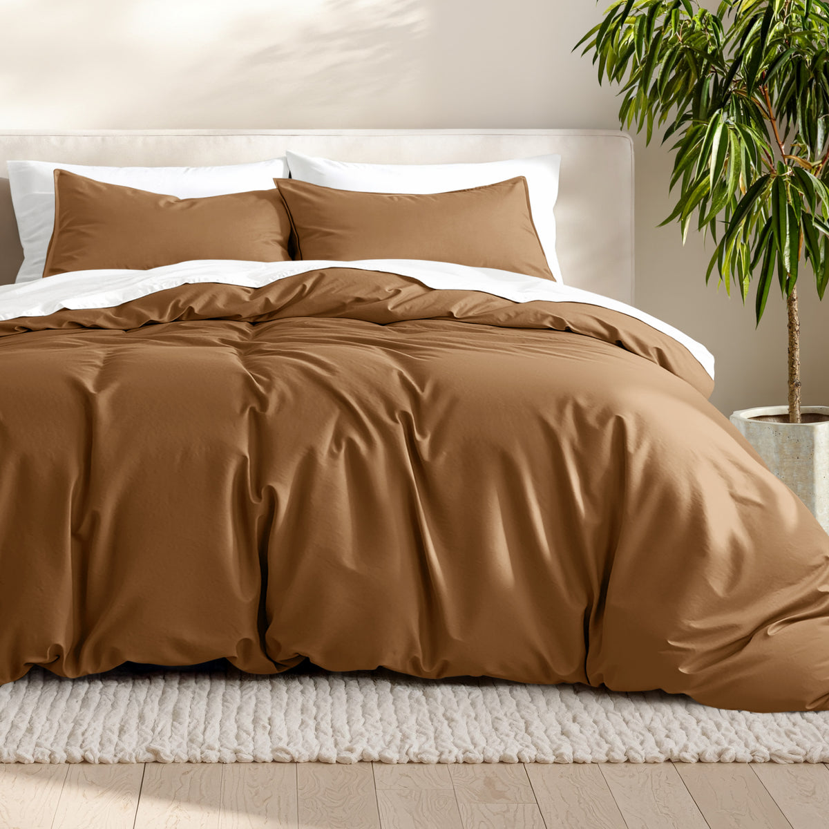 Microfiber bedding set on a bed with a neutral background