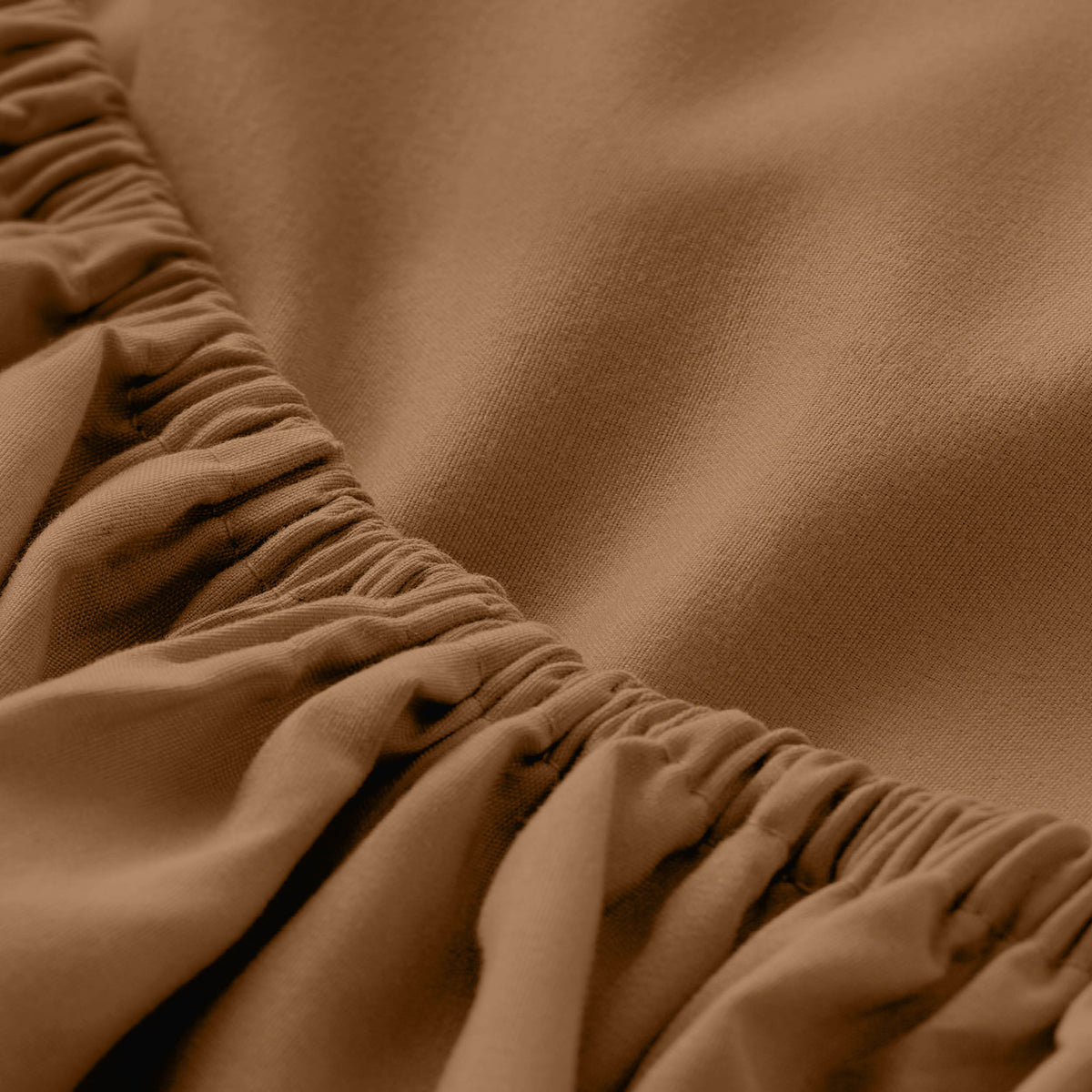 Close-up of fitted sheet with all around elastic