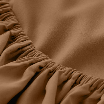 Close-up of fitted sheet with all around elastic