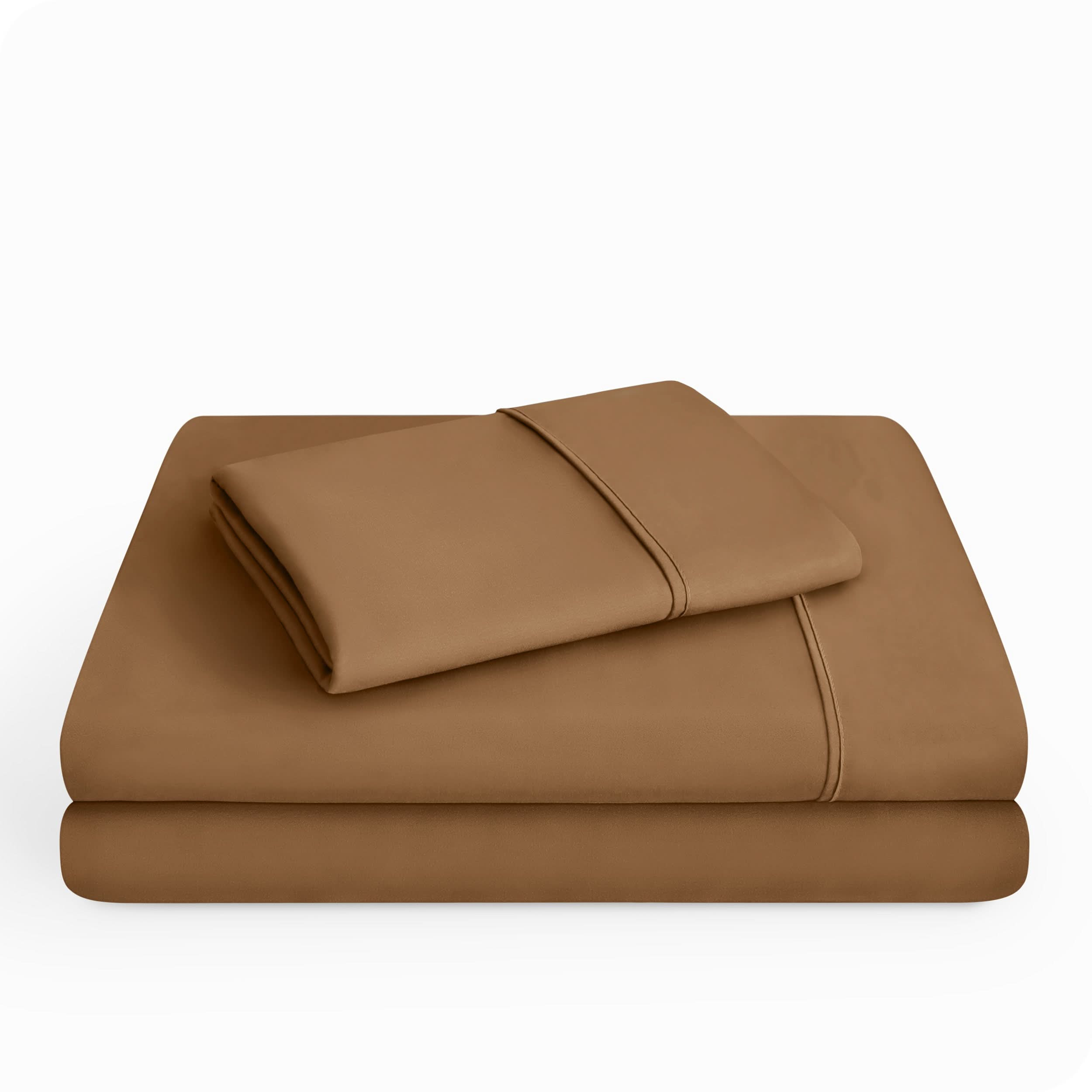 Microfiber sheet set folded and stacked neatly.