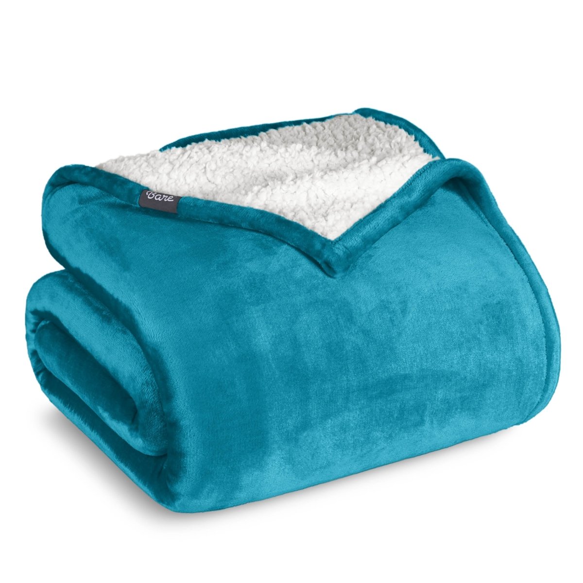 A sherpa blanket folded neatly while showing both sides
