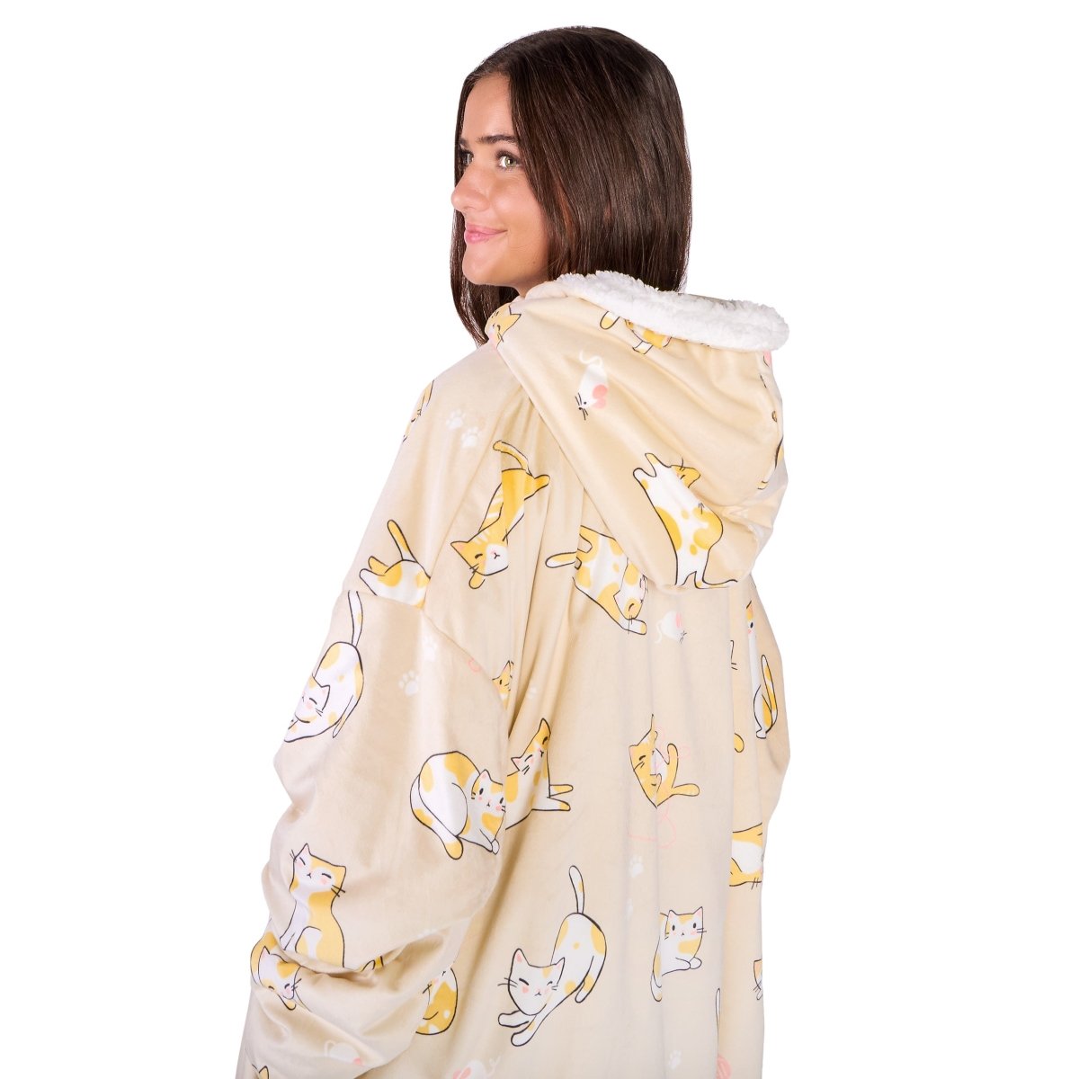 Person wearing a hooded blanket on a white background