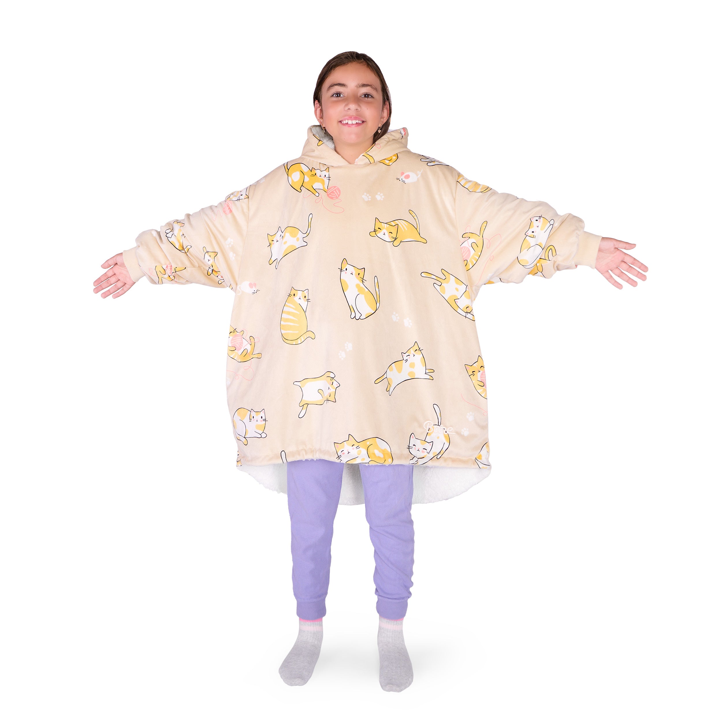 A child wearing a hooded blanket