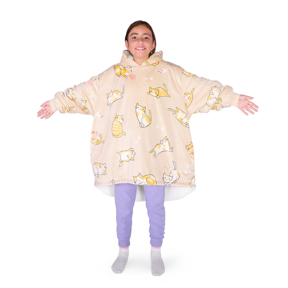 A child wearing a hooded blanket