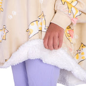Child wearing a Bare Home wearable blanket