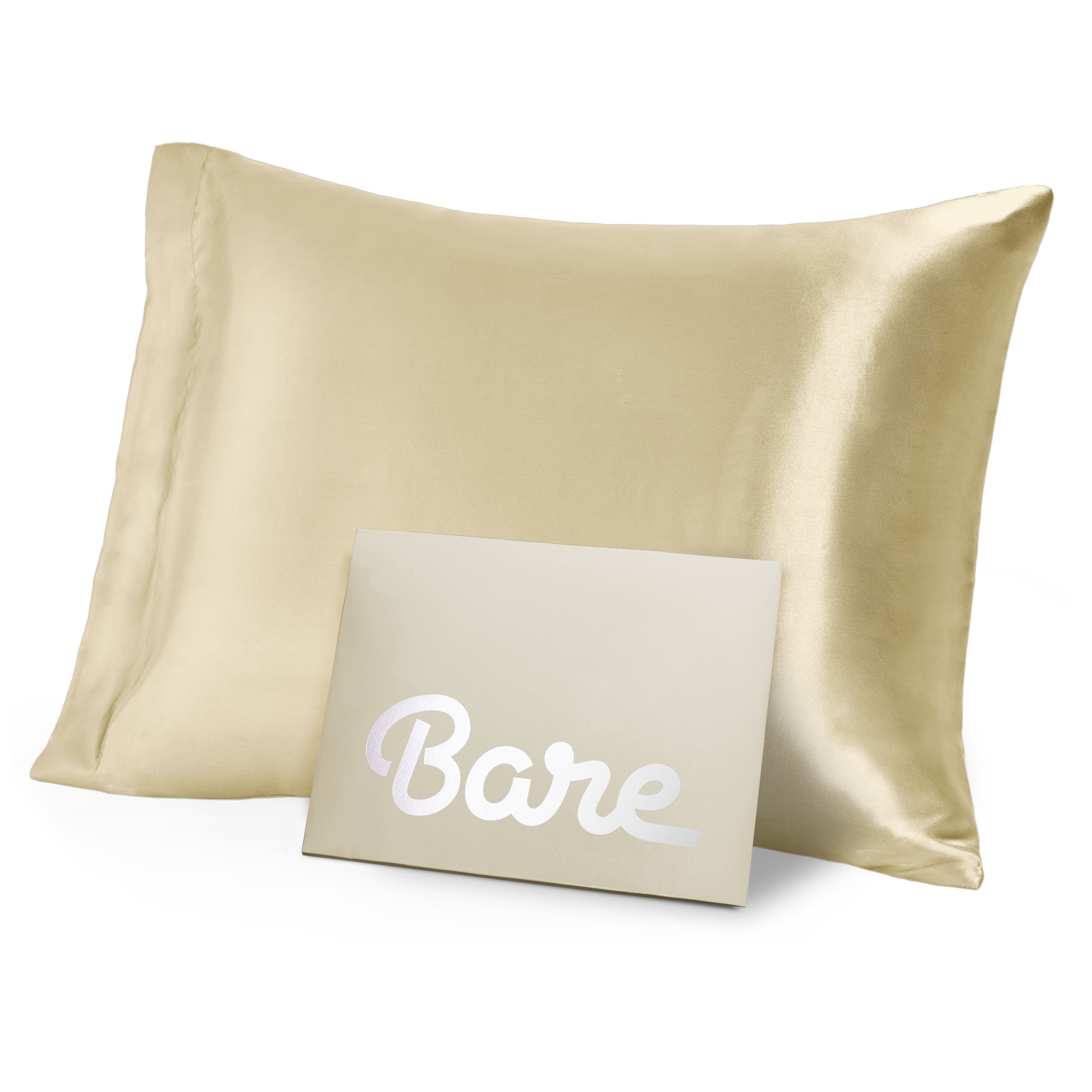 A champagne mulberry silk pillowcase on a pillow